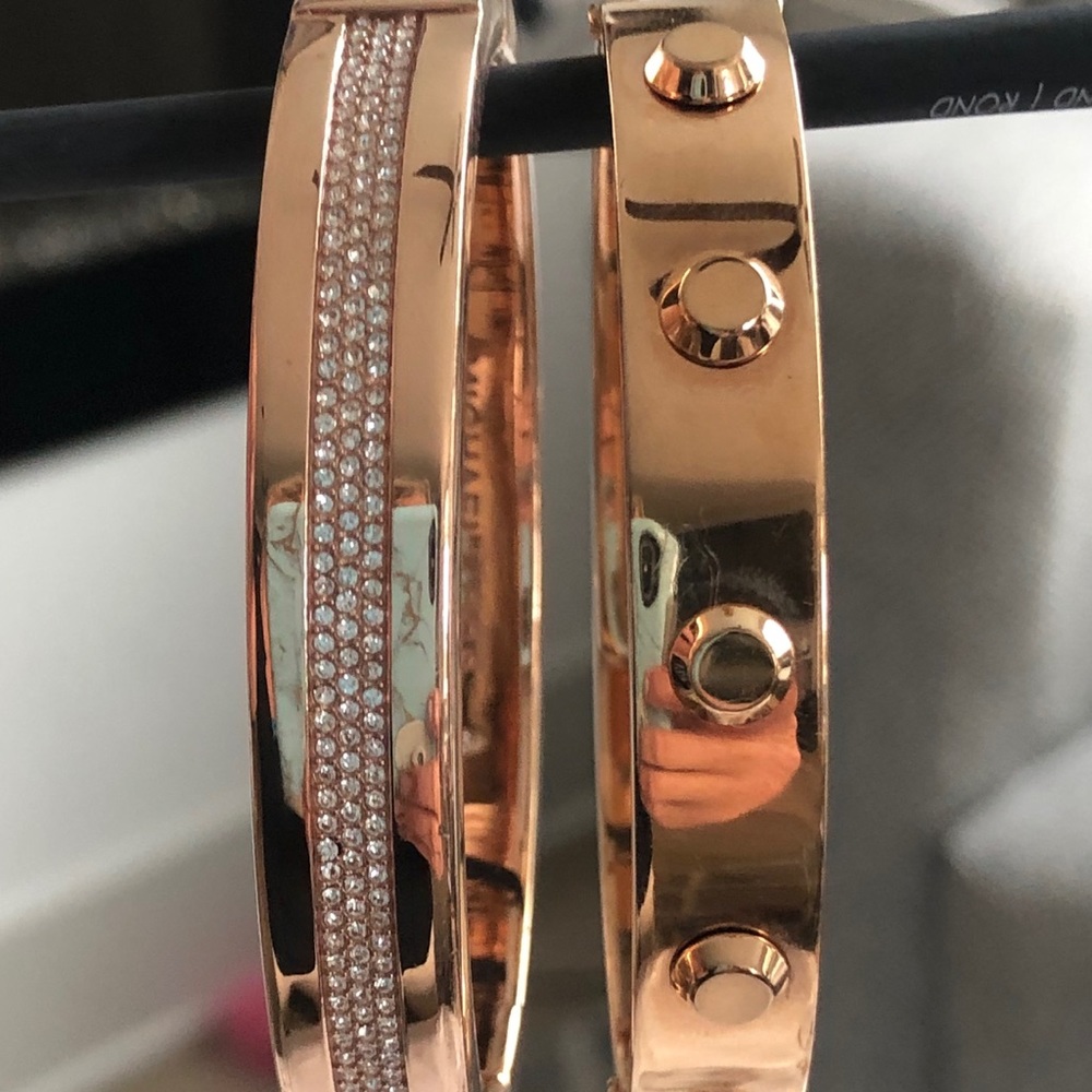 Set of Michael Kors bangle bracelets.